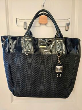 Black Quilted Tote with Glossy Trim and Pendant Charm